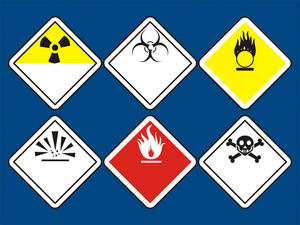 Bild vergrößern: Verschiedene Gefahrengutsymbole auf blauem Hintergrund.