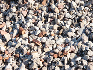 Bild vergrößern: Viele verschieden farbige kleine Steine.